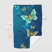 青い背景に浮かぶ金色の蝶 ゴルフタオル (インサイチュ)