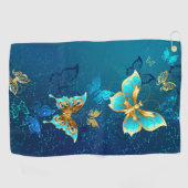 青い背景に浮かぶ金色の蝶 ゴルフタオル (横)