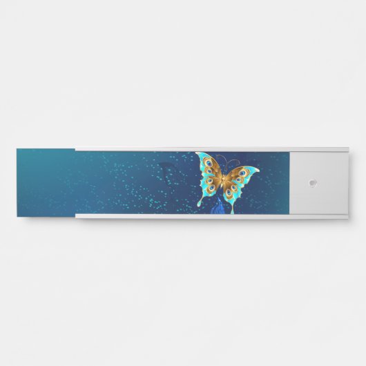 青い背景に浮かぶ金色の蝶 サインプレート (正面)