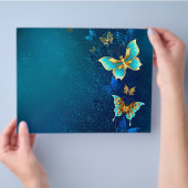 青い背景に浮かぶ金色の蝶 チラシ (手)