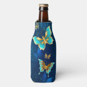 青い背景に浮かぶ金色の蝶 ボトルクーラー (ボトル正面)