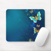 青い背景に浮かぶ金色の蝶 マウスパッド (マウス)