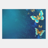 青い背景に浮かぶ金色の蝶 ラッピングペーパーシート (正面2)