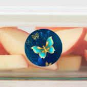 青い背景に浮かぶ金色の蝶 ラベル (貼付)