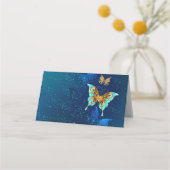 青い背景に浮かぶ金色の蝶 予約カード (裏面)