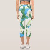 青い背景に白い平和淡い色ののユリ カプリレギンス (裏面)