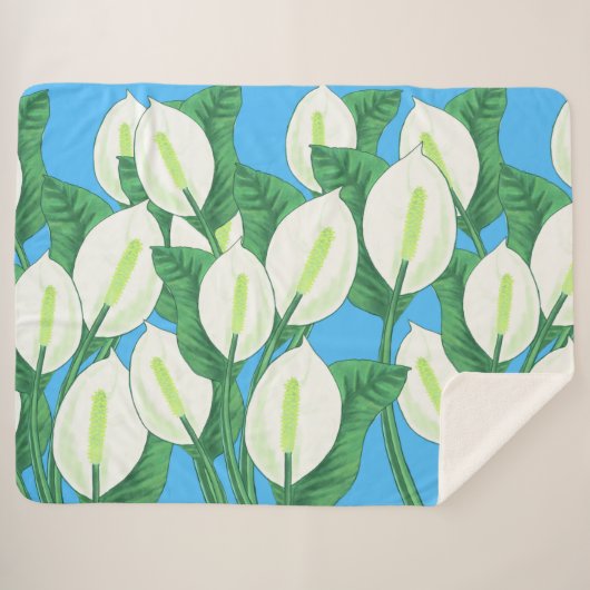 青い背景に白い平和淡い色ののユリ シェルパブランケット (正面(横))