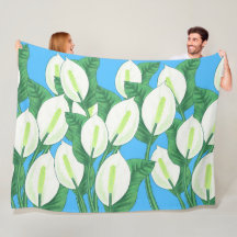 青い背景に白い平和淡い色ののユリ