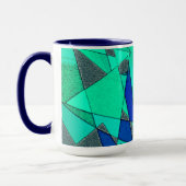 青い背景に緑の三角切り出し、粗い マグカップ (左)