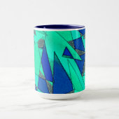 青い背景に緑の三角切り出し、粗い マグカップ (中央)