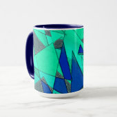 青い背景に緑の三角切り出し、粗い マグカップ (正面左)