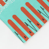 青い背景に赤いスキー フリースブランケット (角)