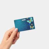 青い背景に金の蝶 バッジ (手持ち)