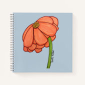 青い背景のオレンジの花 ノートブック (正面)
