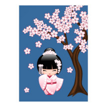青い背景のピンクの着物の可愛いこけし人形