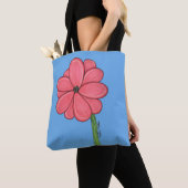 青い背景のピンクの花 トートバッグ (クローズアップ)