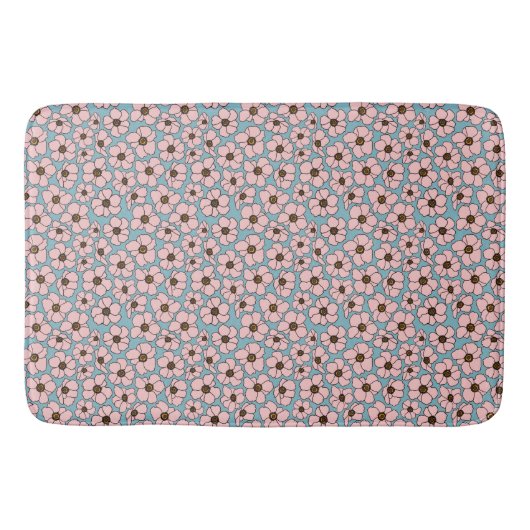 青い背景のピンクの花 バスマット (正面)
