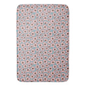 青い背景のピンクの花 バスマット (正面縦)