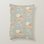 青い背景のピンク色の白い赤面バラ アクセントクッション (裏面(縦))