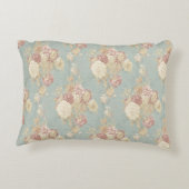 青い背景のピンク色の白い赤面バラ アクセントクッション (裏面)