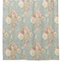 青い背景のピンク色の白い赤面バラ