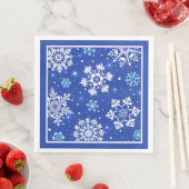 青い背景の白い雪の結晶 (インサイチュ)