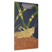 青い背景の緑の草の中のバッタ クリップボード (右)