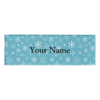 青い背景の雪片 名札