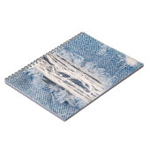 青い色あせたジーンズ、質感はジーンズをバックに裂いた ノートブック (左側)