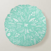 青い色調と緑の色調の羽とシダ ラウンドクッション (正面)