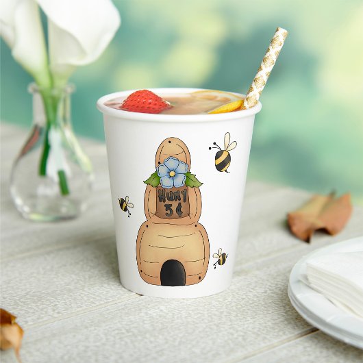 青い花とミツバチが咲くミツバチの巣箱 紙コップ