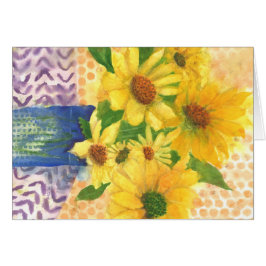 青い花瓶の黄色いデイジー