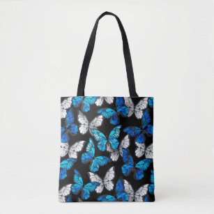 青い蝶の形をした濃いシームレスパターン トートバッグ