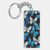 青い蝶モルフォとダークシームレスパターン キーホルダー (正面左)