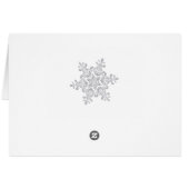 青い表の上の銀のスノーフレーク (裏面横)