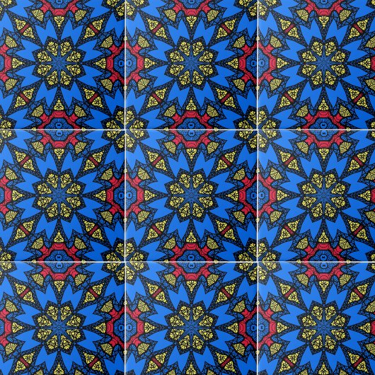 青い赤い黄色のアフリカの民族幾何学模様 タイル