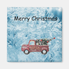 青い雪の上に赤いヴィンテージトラックの背景 マグネット