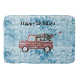 青い雪の上の赤いヴィンテージトラック バスマット
