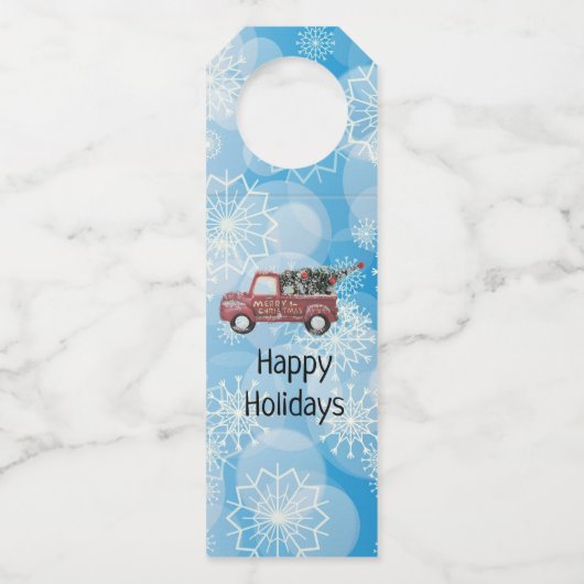 青い雪の上の赤いヴィンテージトラック ボトルネックタグ (正面)