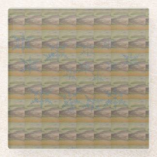 青い雪の結晶の波が海岸に打ち寄せる ガラスコースター