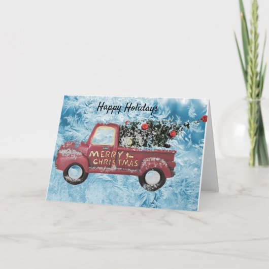 青い雪の結晶の背景にある赤いヴィンテージトラック シーズンカード (正面)