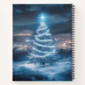 青く輝く冬の夜のクリスマスツリー ノートブック (裏面)