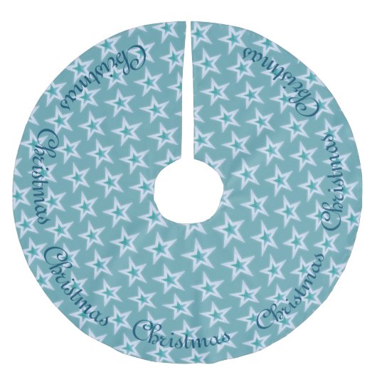 青く、銀製のクリスマスの星 ブラッシュドポリエステルツリースカート (正面)