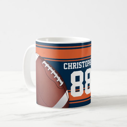 青とオレンジのストライプジャージーグリッドアイアンフットボール コーヒーマグカップ (正面左)