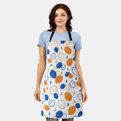 青とオレンジのレモンパターンよくはしゃぐフルーツをテーマにした エプロン (着用した状態)