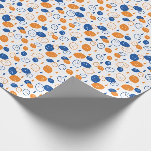 青とオレンジのレモンパターンよくはしゃぐフルーツをテーマにした ラッピングペーパー (角)