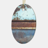 青とティール（緑がかった色）の錆びたトラックのクローズアップ セラミックオーナメント (左)