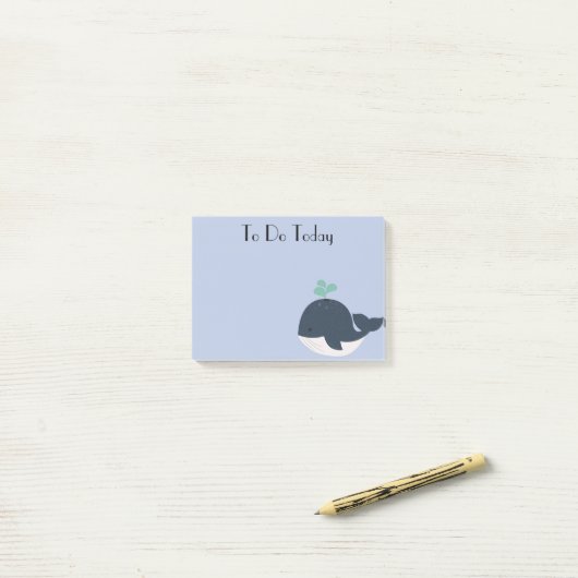 青と白のクジラの投稿に関するメモ ポストイット (デスク上)