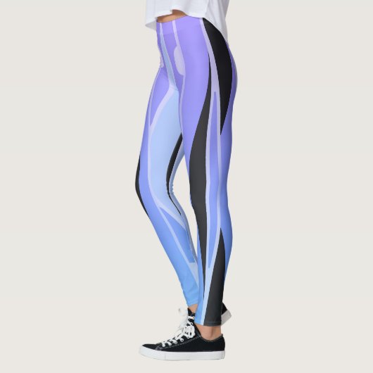 青と紫のレギンスと波形の黒いストライプ レギンス (左)