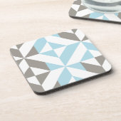 青と銀の幾何学的ジグザグ コースター (左側)